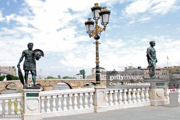 panoramic view of the bridge of civilizations in skopje. - skopje stock pictures, royalty-free photos & images