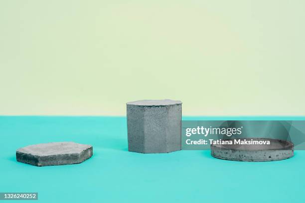 cosmetic background for product presentation. concrete podiums. - piedistallo foto e immagini stock