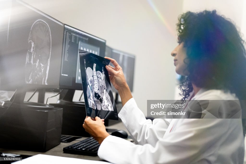 Retro Radiologist Computer Female Radiologist Analysing X Ray Image While Working On Computer High ...