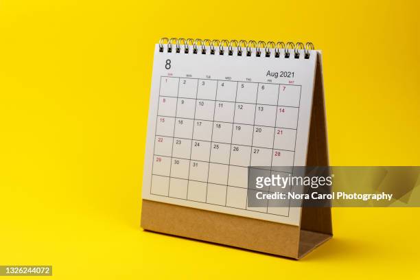 august 2021 calendar on yellow background - 1 august bildbanksfoton och bilder