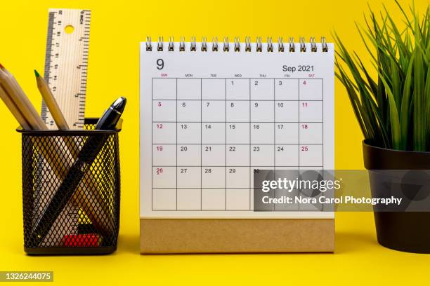 september 2021 calendar on yellow background - diary page stock pictures, royalty-free photos & images