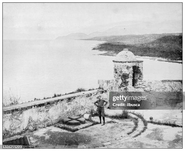 antique black and white photograph: top of morro castle, entrance to santiago de cuba harbor - el morro castle stock illustrations