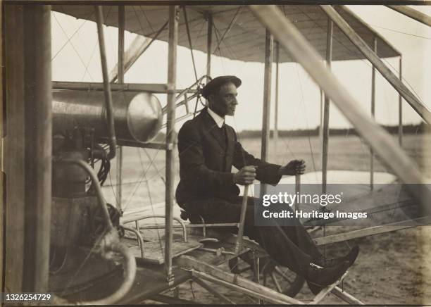 Wilbur Wright in the flyer, 1908. Private Collection. Artist Anonymous.