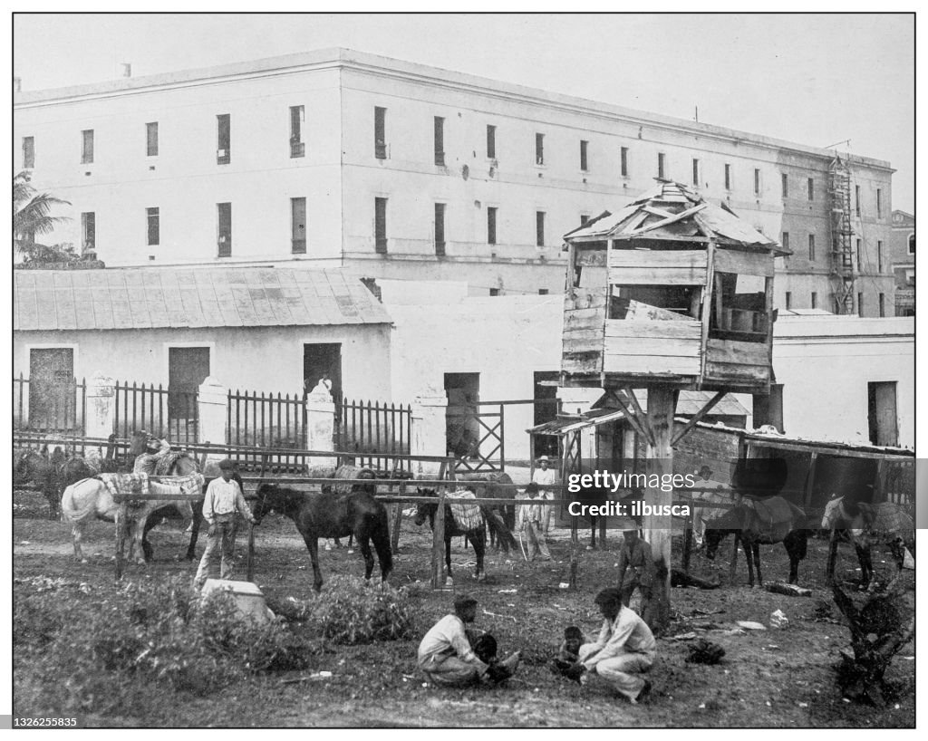 Antique black and white photograph: Market and barracks near Morro Castle, Puerto Rico
