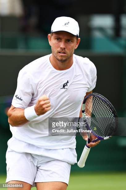 James Duckworth of Australia celebrates in his Men's Singles First Round match against Radu Albot of Moldova during Day Three of The Championships -...