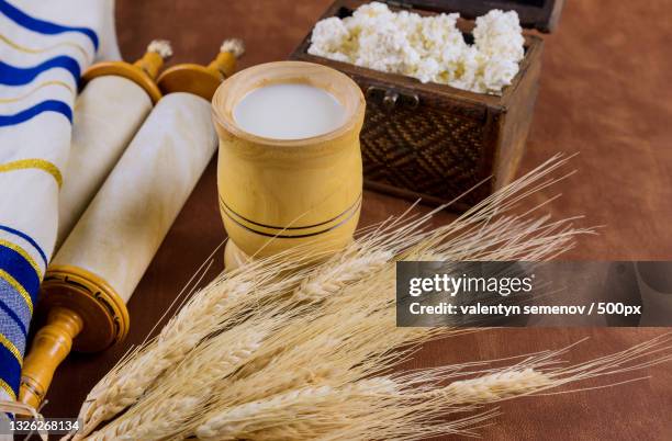 traditional jewish holiday items on textured background - shavuot stock pictures, royalty-free photos & images