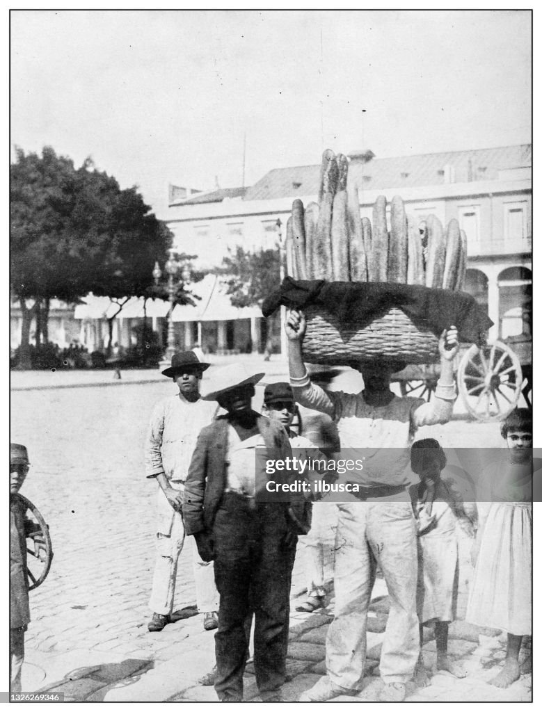 Antique black and white photograph: Baker bread seller, Puerto Rico