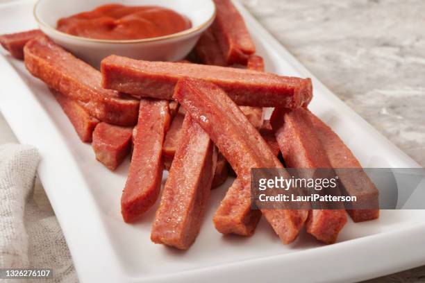deep fried spiced ham fries - canned meat stock pictures, royalty-free photos & images