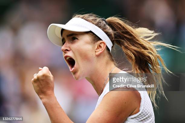 Elina Svitolina of Ukraine celebrates a point in her Ladies' Singles First Round match against Alison Van Uytvanck of Belgium during Day Three of The...