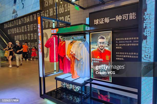 Jerseys for UEFA Euro 2020 are on display at an Adidas store on June 29, 2021 in Shanghai, China.