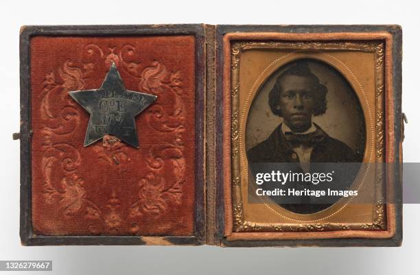 Tintype of Creed Miller, an African American soldier belonging to the Kentucky 107th Regiment, Company E . The tintype is encased in a copper...