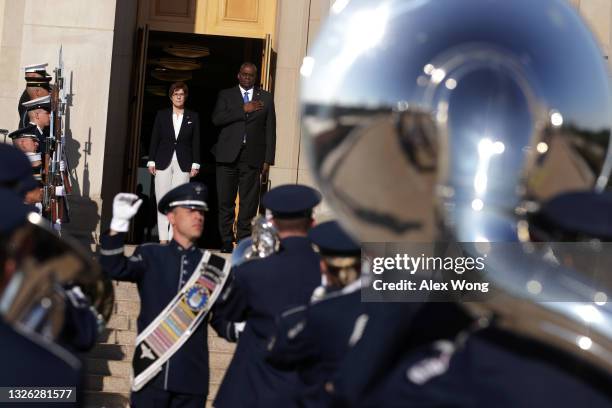 Secretary of Defense Lloyd Austin welcomes German Minister of Defense Annegret Kramp-Karrenbauer during an enhanced honor cordon ceremony at the...