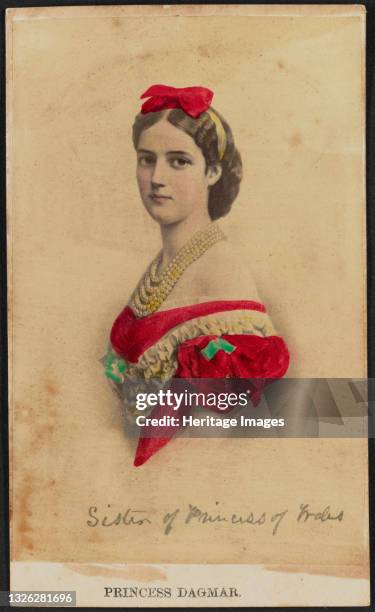 Hand-colored albumen print of Maria Feeodorovna, or Princess Dagmar, shown in bust portrait. Her body is facing with her left side foremost and her...