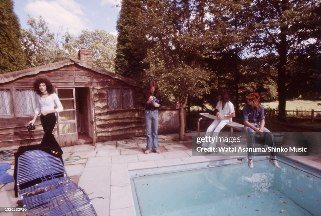 Queen Ridge Farm Queen group portrait by a swimming pool at Ridge Farm Studio during ...