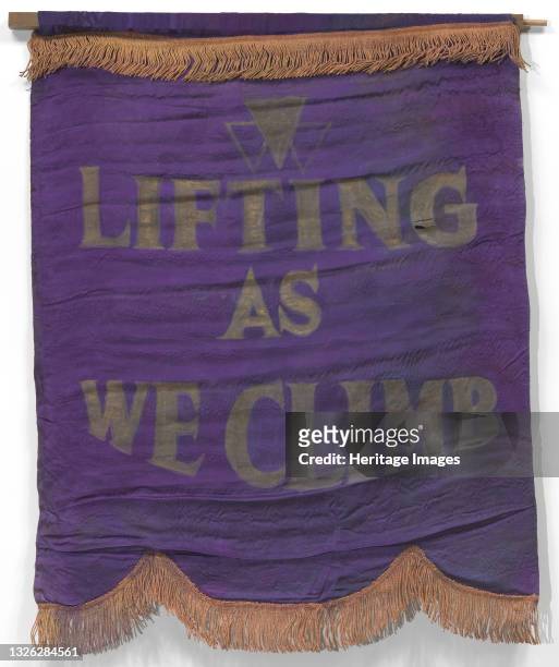 Purple silk banner with gold fringe and the National Association of Colored Women's Clubs' motto, 'LIFTING / AS / WE CLIMB' painted in large gold...