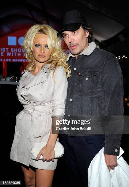 Actress Pamela Anderson and photographer David LaChapelle attend 2011 MOCA Gala, An Artist's Life Manifesto, Directed by Marina Abramovic at MOCA...