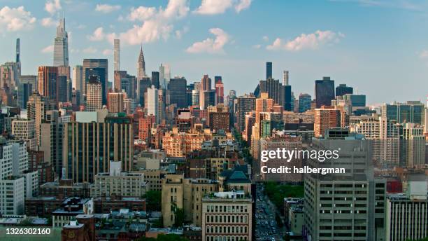aerial view of manhattan looking uptown from the east village - east village stock pictures, royalty-free photos & images