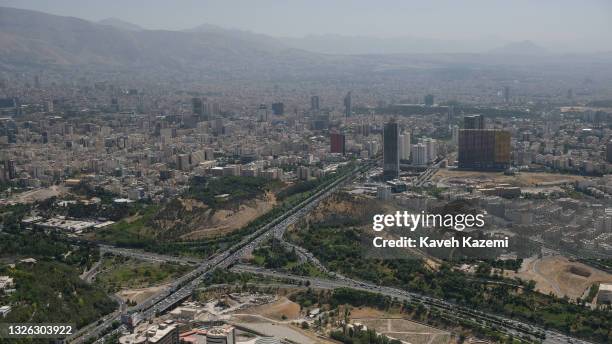 An elevated view of city skyline seen from one of the upper decks of Milad Tower on June 20, 2021 in Tehran, Iran.