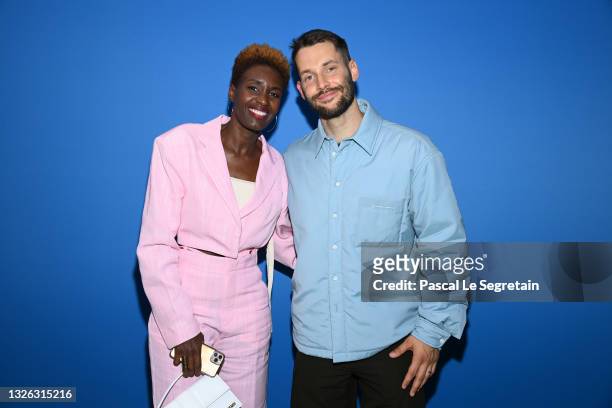 Rokhaya Diallo and Simon Porte Jacquemus attend the photocall after the Jacquemus "La Montagne" show at La Cite Du Cinema on June 30, 2021 in...