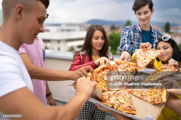 pizza time with friends - live event child stock pictures, royalty-free photos & images