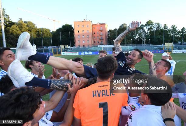 Antonio Buscè, head coach of Empoli U19 celebrates the victory with his players during the Primavera 1 TIM Playoffs Final match between Atalanta BC...