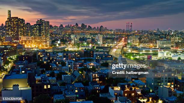 new york city at night with bridge connections - drone shot - greenpoint brooklyn stock pictures, royalty-free photos & images
