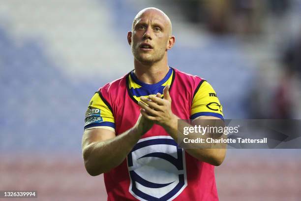 Chris Hill of Warrington Wolves applauds the fans after the Betfred Super League match between Wigan Warriors and Warrington Wolves at DW Stadium on...