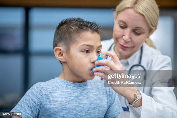 Child Using Puffer 1,961 Asthma Puffer Child Stock Photos, High-Res Pictures, and Images ...