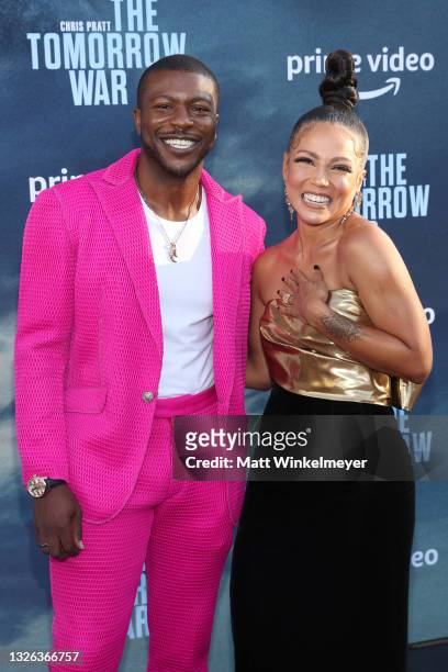 Edwin Hodge and Jasmine Mathews attend the premiere of Amazon's "The Tomorrow War" at Banc of California Stadium on June 30, 2021 in Los Angeles,...
