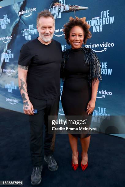 Chris McKay and Global Chief Marketing Officer at Prime Video & Amazon Studios Ukonwa Ojo attend the premiere of Amazon's "The Tomorrow War" at Banc...