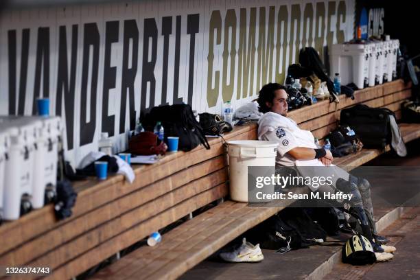 Rodriguez of the Vanderbilt reacts alone in the dugout after being shutout 0-9 against Mississippi St. During game three of the College World Series...