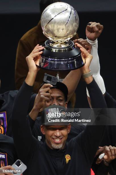 Head Coach Monty Williams of the Phoenix Suns holds the Western Conference Championship trophy after the Suns defeated the LA Clippers in Game Six of...