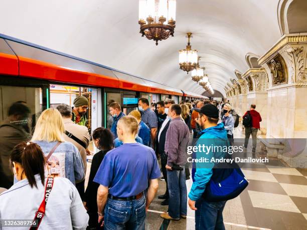 people in moscow subway. - moscow railway station stock pictures, royalty-free photos & images