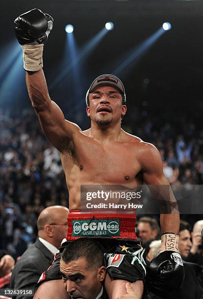 Juan Manuel Marquez reacts before the decision is announced that he lost by majority decision to Manny Pacquiao during the WBO world welterweight...