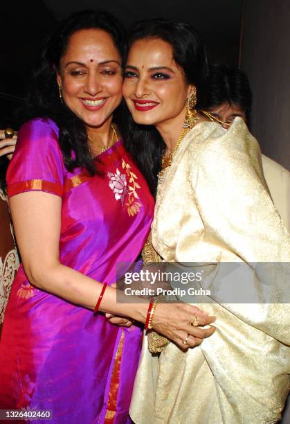 Hema Malini and Rekha attend the special screening of film 'Tell Me O Khuda' on October 25, 2011 in Mumbai,India