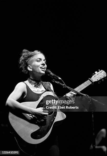 Ani DiFranco performing at The Beacon Theatre in New York City on November 21, 1996. She is playing a Alvarez Yairi acoustic guitar.