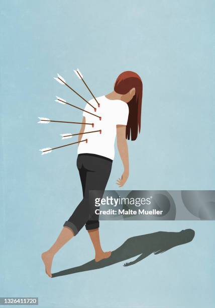 dejected woman walking with arrows in back - verbrechensopfer stock-grafiken, -clipart, -cartoons und -symbole