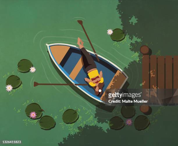 ilustrações de stock, clip art, desenhos animados e ícones de view from above woman relaxing in boat on lily pond - relaxation