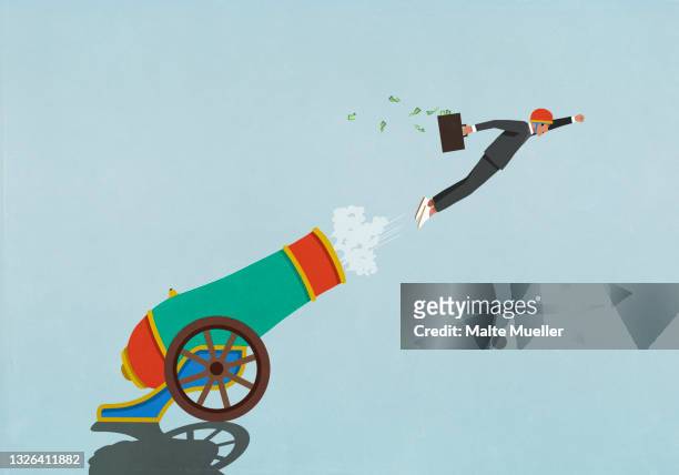 excited businessman with money briefcase flying out of cannon - unternehmer stock-grafiken, -clipart, -cartoons und -symbole