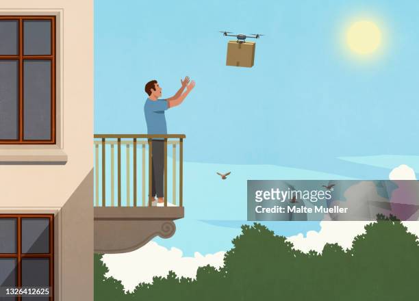 man receiving drone package on sunny apartment balcony - autonomous technology stock-grafiken, -clipart, -cartoons und -symbole