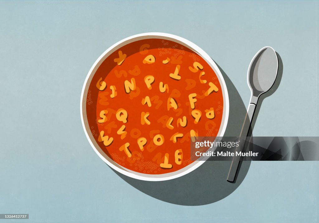 View from above alphabet soup in bowl