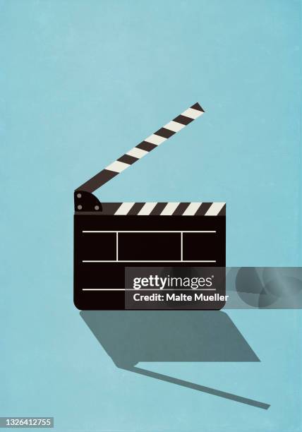 film slate on blue background - clapperboard stock illustrations