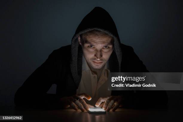 Man Using Cell Phone Light Face Glow In The Dark Man Photos and Premium High Res Pictures - Getty Images