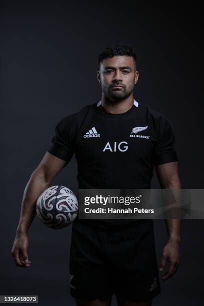 Richie Mo'unga poses during the New Zealand All Blacks player portrait session at the Heritage on June 23, 2021 in Auckland, New Zealand.
