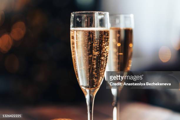 close-up of glasses with champagne - シャンパン ストックフォトと画像