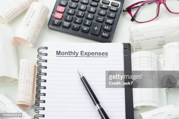 monthly expense bills - roman numeral stock-fotos und bilder