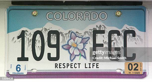 Car sports the new Columbine "Respect Life" license plate July 13, 2001 in Littleton, CO. Mark Schnurr and Dale Todd, parents of students shot at...