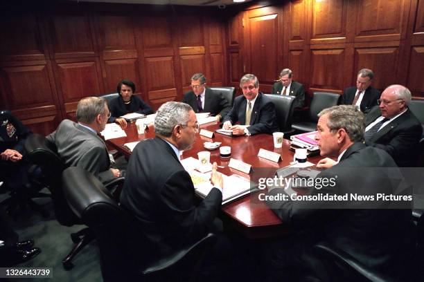 President George W Bush meets with members of the National Security Council meeting in the White House's Situation Room, Washington DC, October 2,...