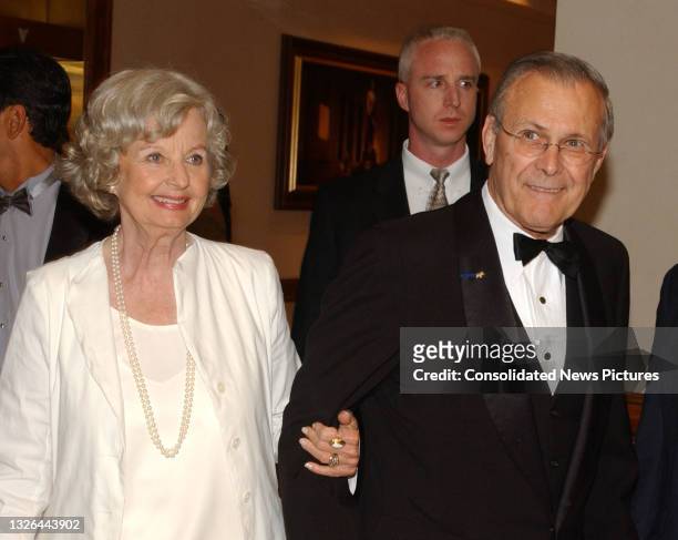 Married couple, philanthropist Joyce Pierson and US Secretary of Defense Donald Rumsfeld arrive for the 2004 White House Correspondents Association...