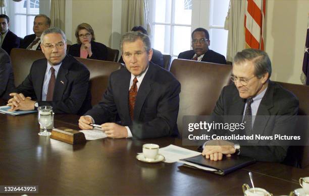 President George W Bush meets with his new cabinet in the White House's Cabinet Room, Washington DC, January 31, 2001. Pictured with him are...